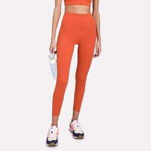 Le Ore Bandier Andria Paneled High-Rise Leggings Spice